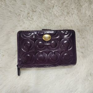 Coach Peyton Op Art Embossed Patent Leather Wallet Dark Merlot Purple